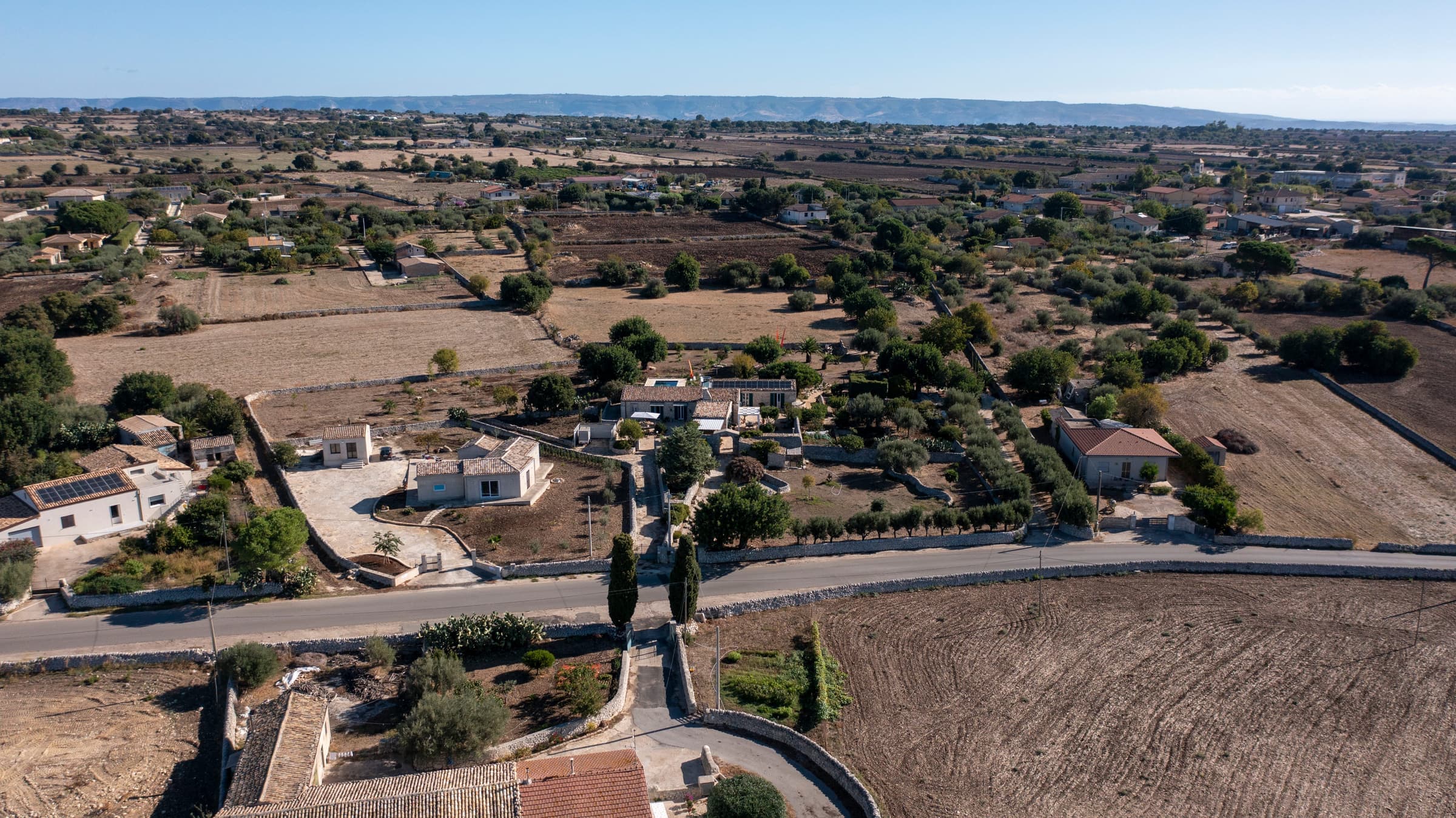 Bird's eye view of the entire property with gardens