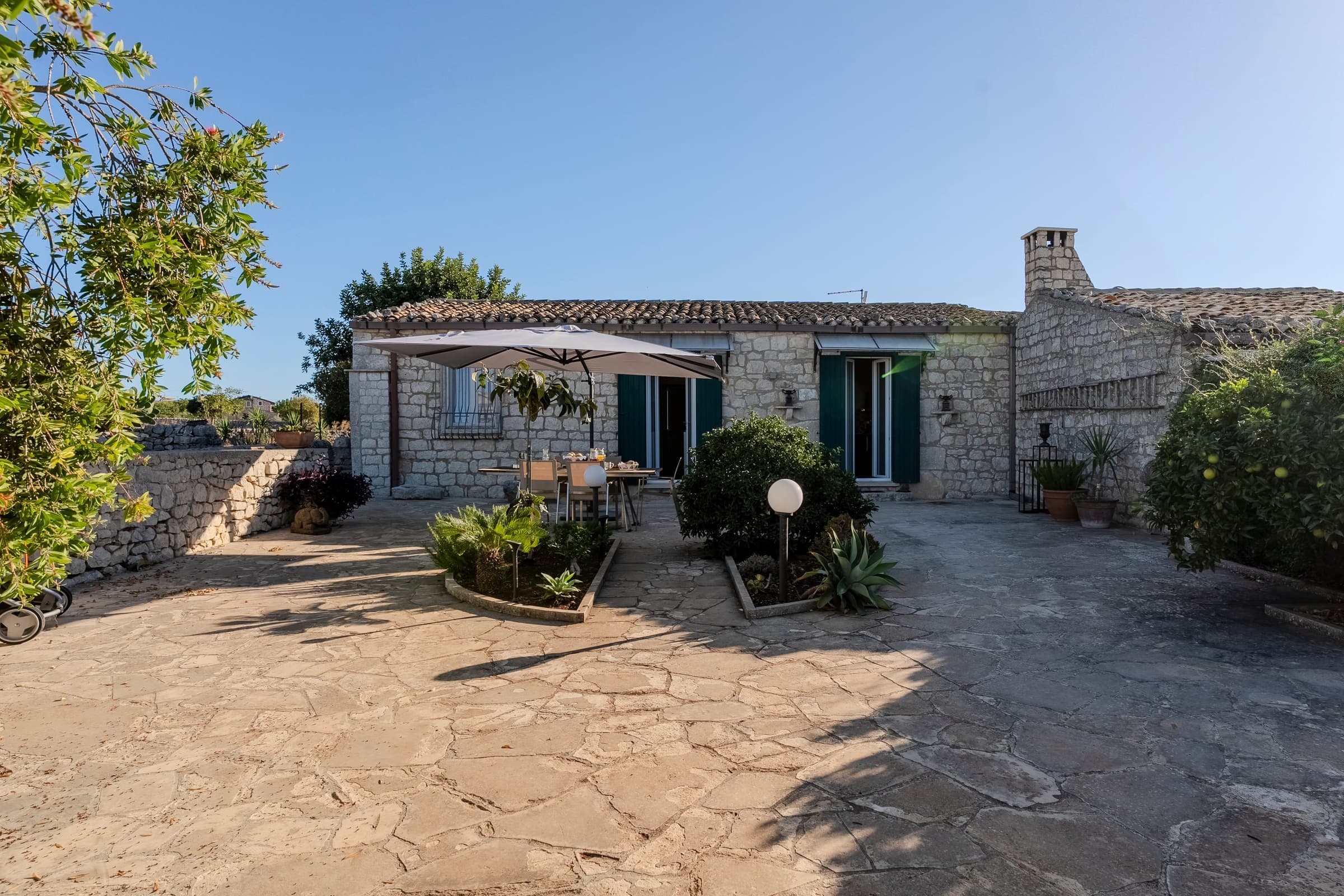 Exterior view of the stone facade and entrance