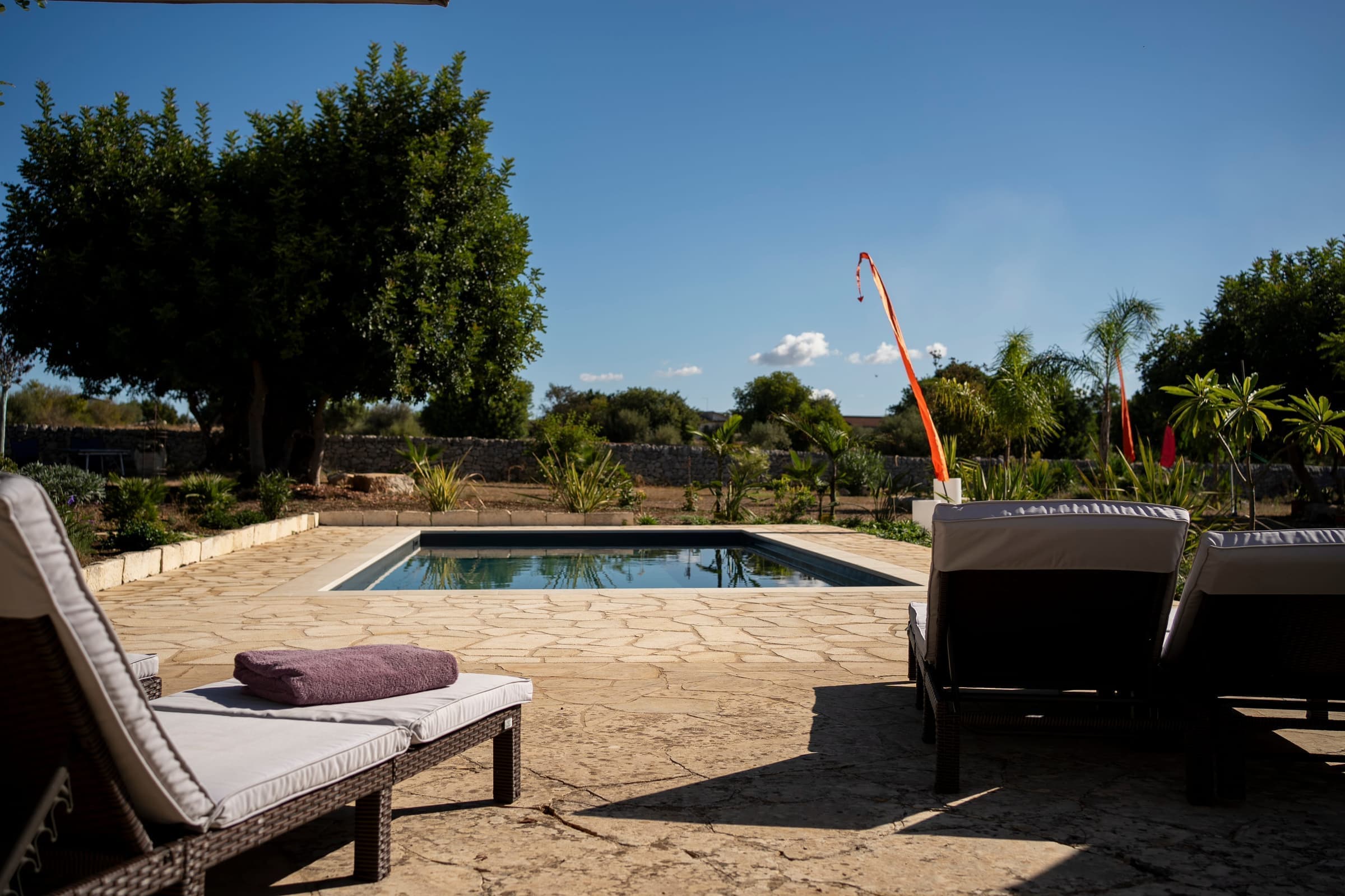 Pool lounging area with panoramic views