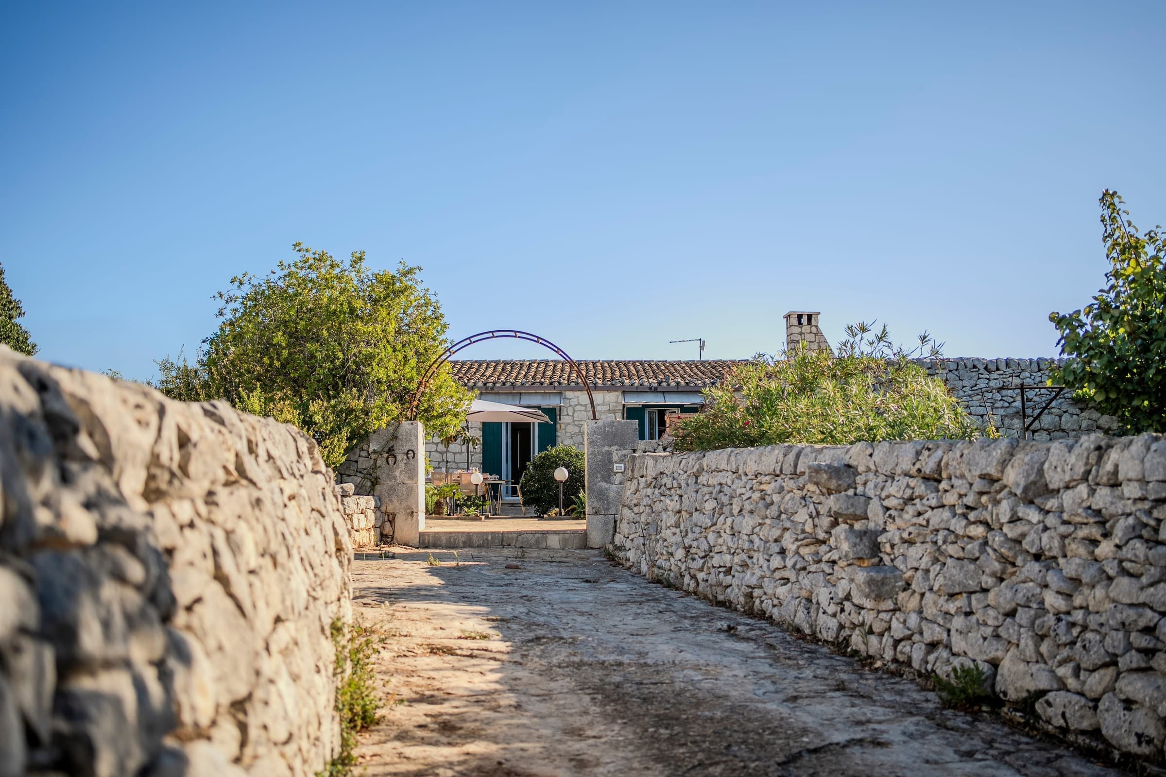Stone pathway leading to the entrance