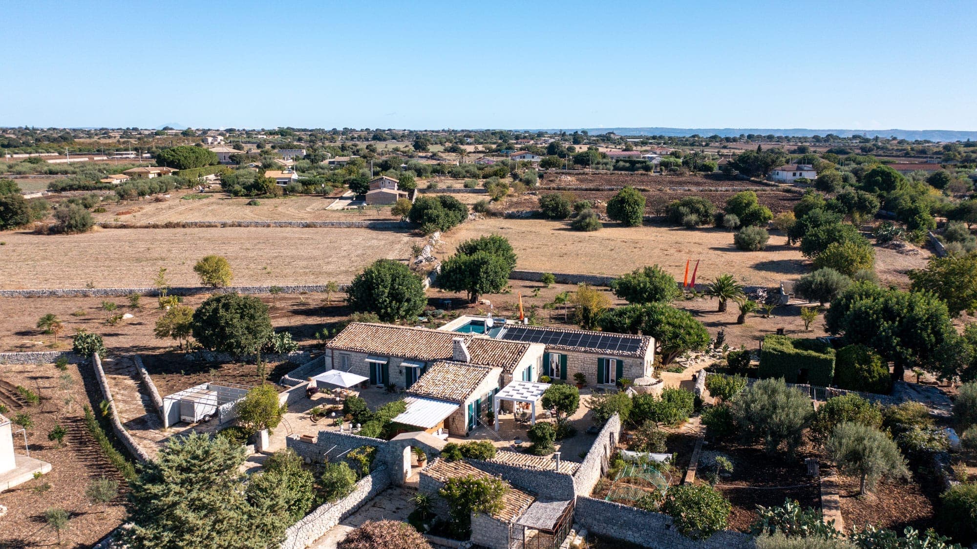 Breakfast terrace with stone walls